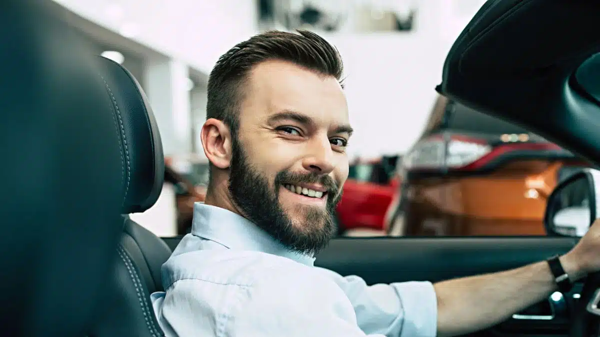Man driving his car