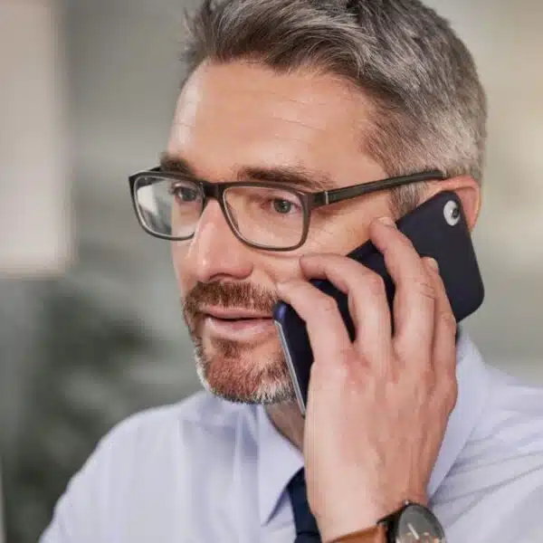 Man reviewing his accomplishments at work