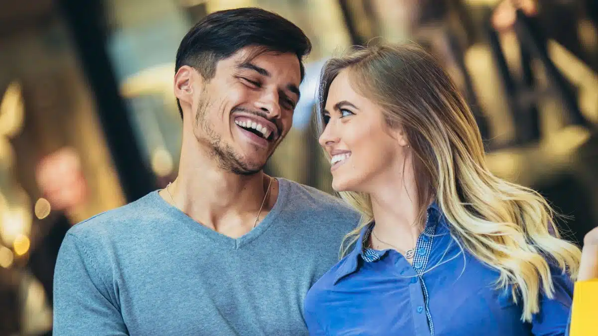 couple smiling together after shopping