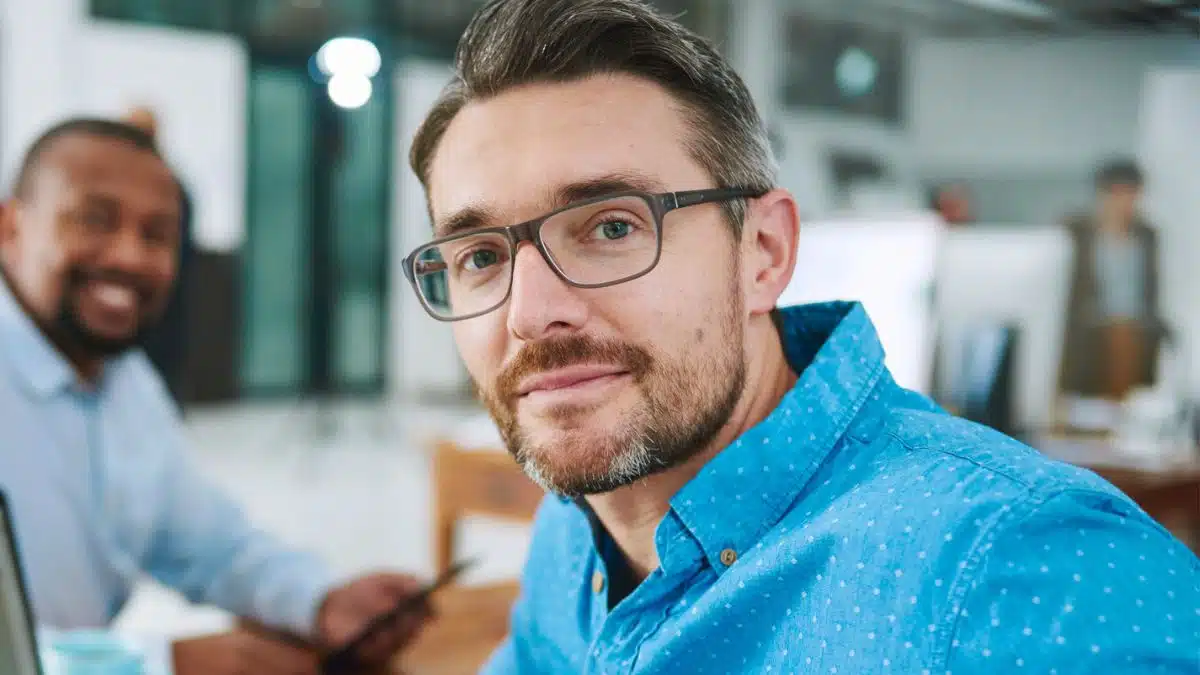 man glasses happy work