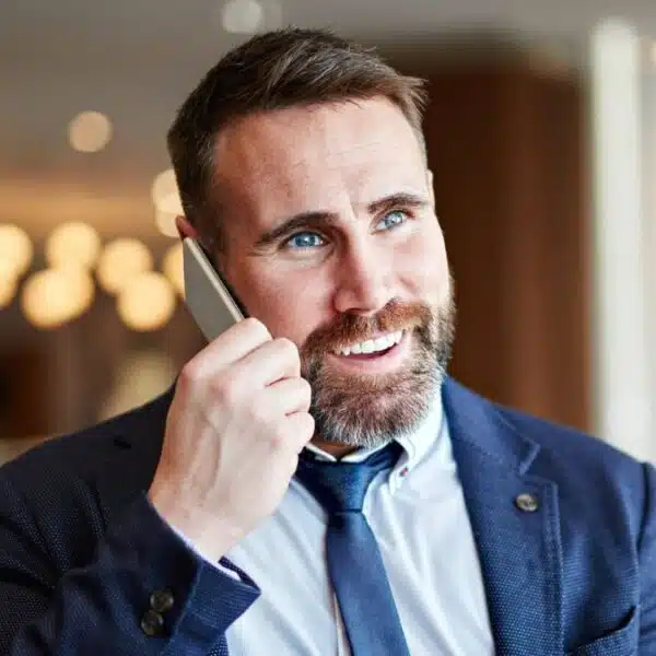 man suit talking on the phone