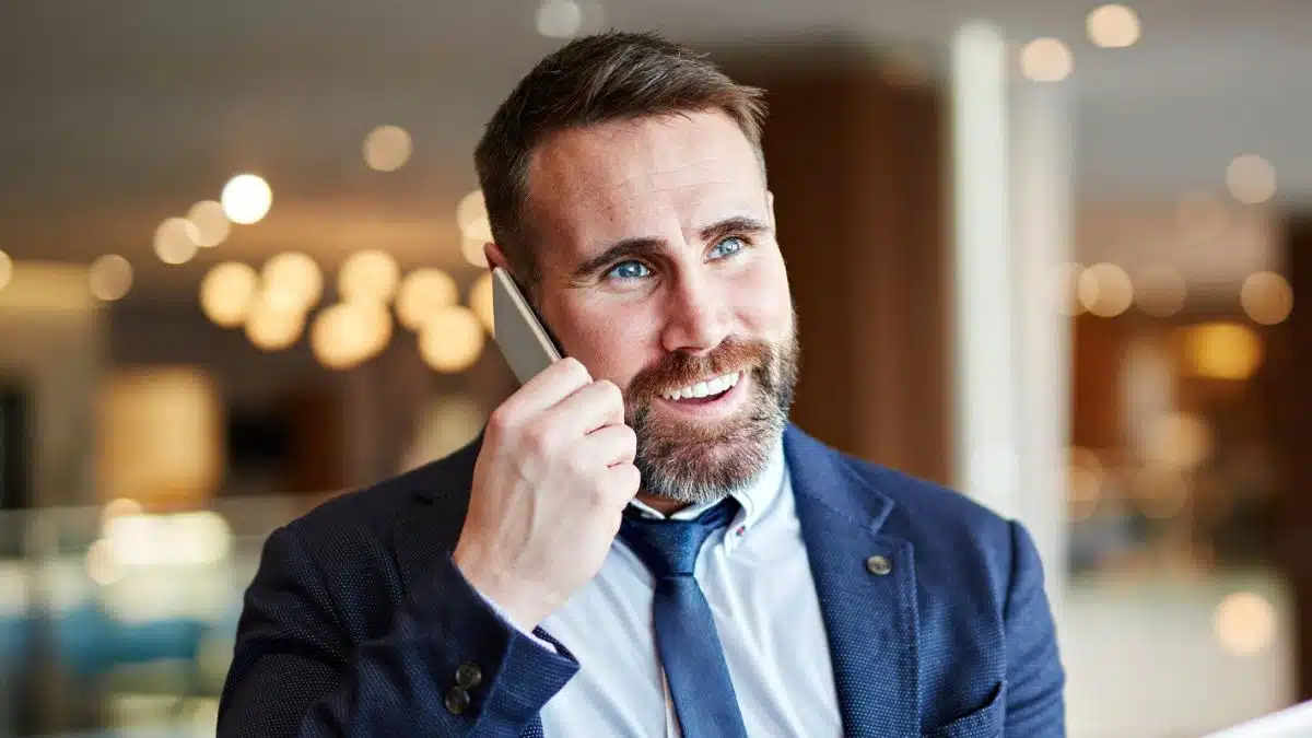 man suit talking on the phone