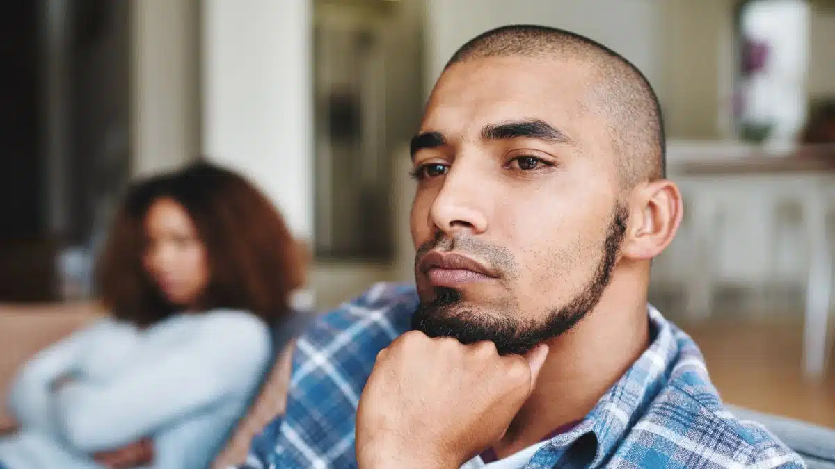 man with beard thinking