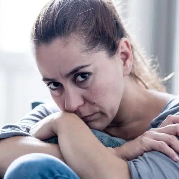 woman alone upset stressed