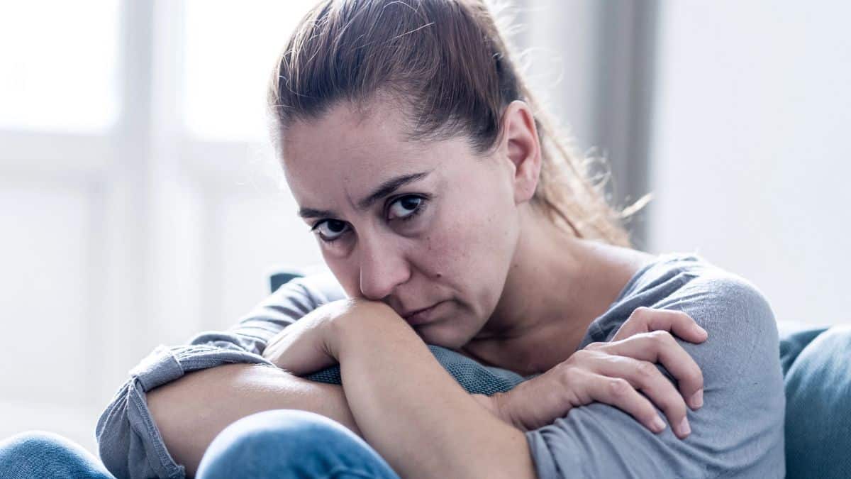woman alone upset stressed