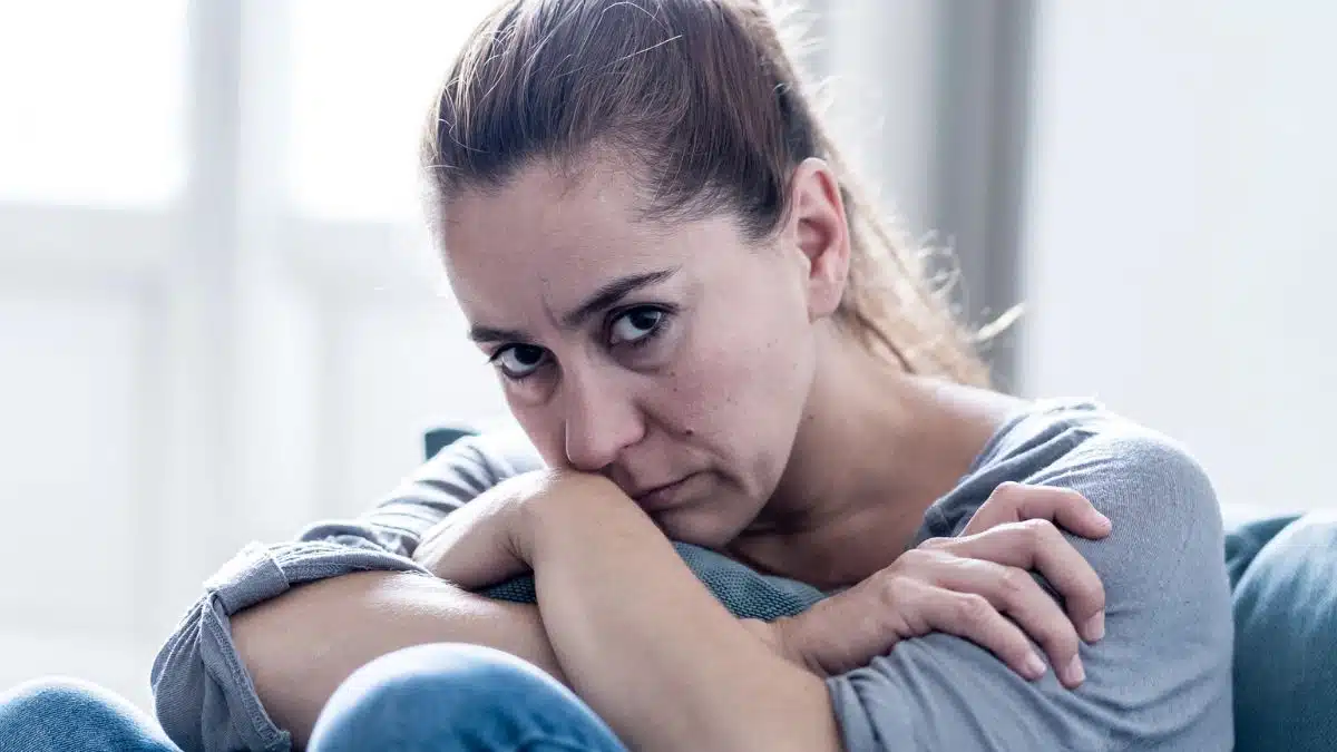 woman alone upset stressed