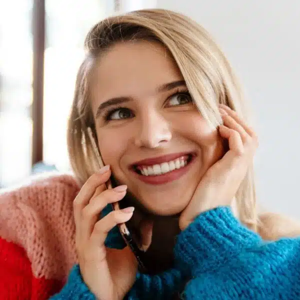 woman sweater and the phone