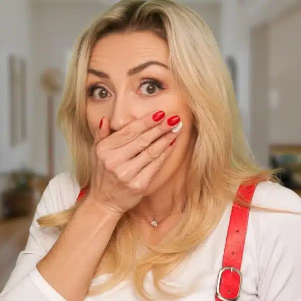 woman with overalls surprised