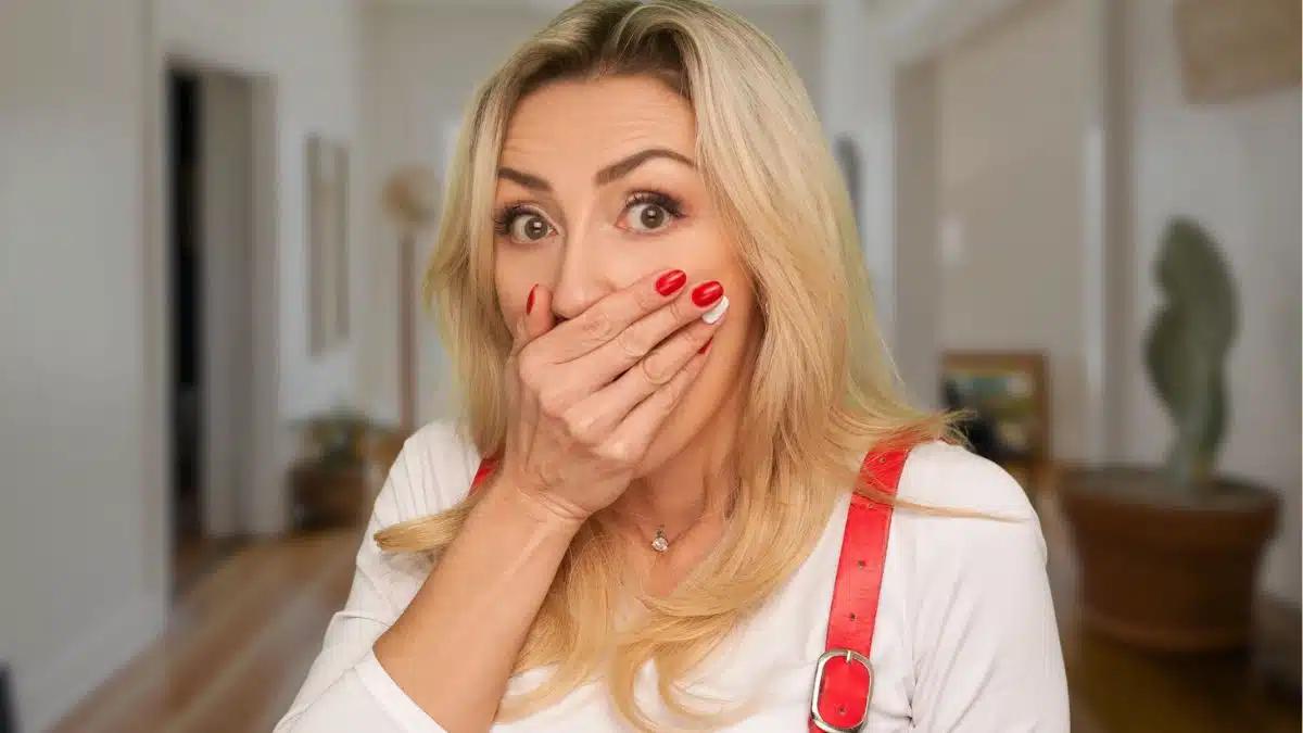 woman with overalls surprised