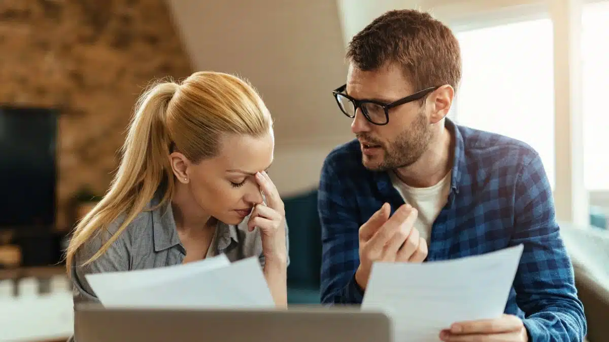 Couple reviewing their budget