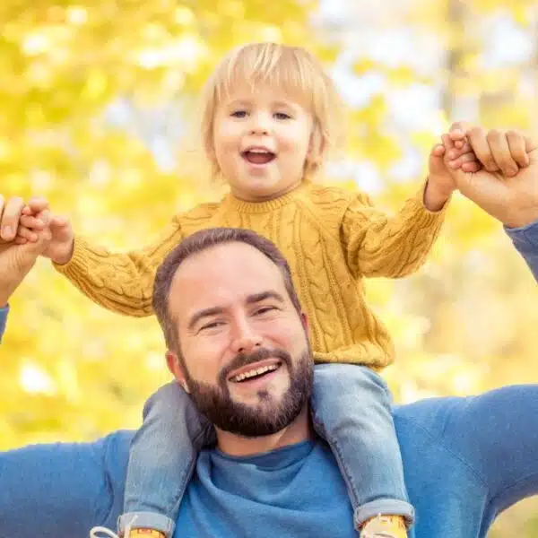 Father carrying his child outside