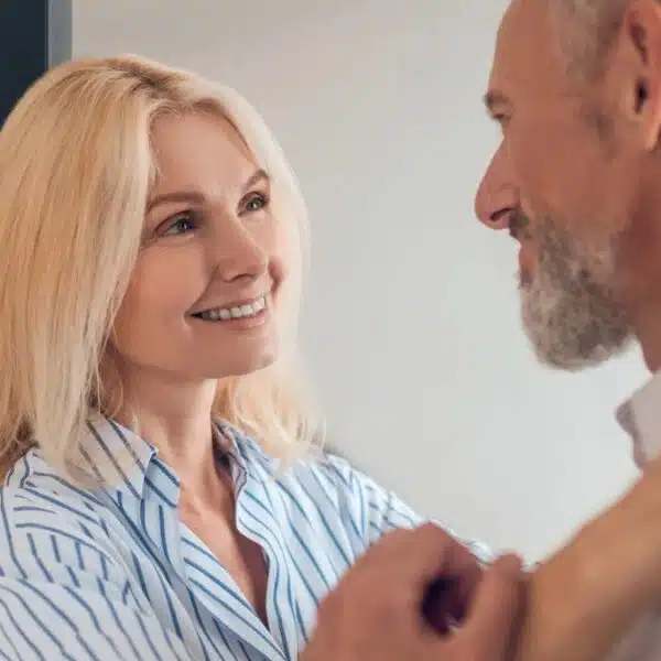 Husband and wife celebrating their financial goals