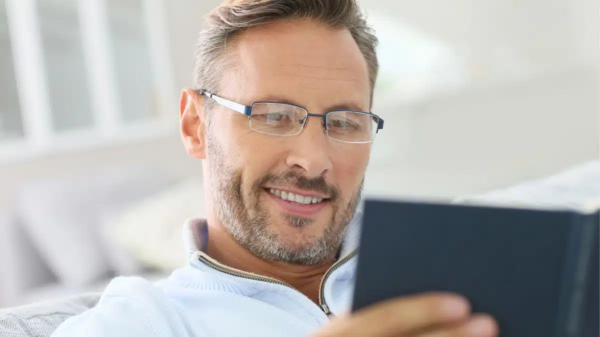 Man reading a financial book