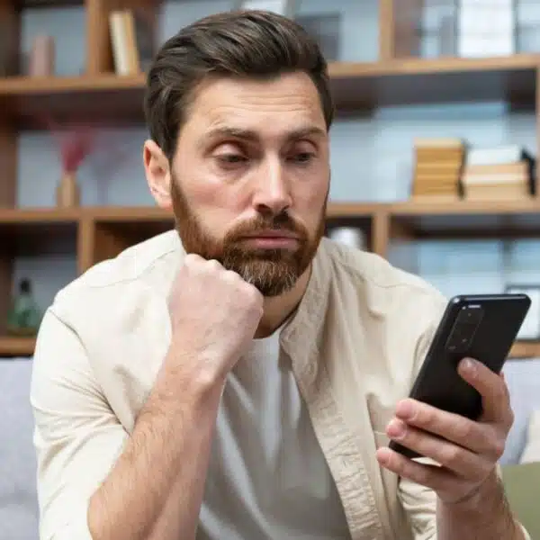 Man reviewing his low balance bank account