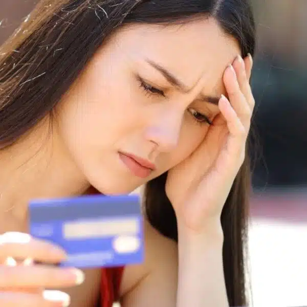 Woman carrying large credit card debt