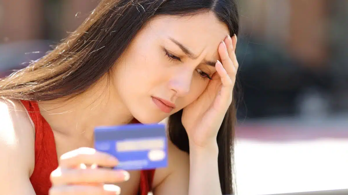 Woman carrying large credit card debt