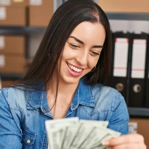 Woman counting her cash