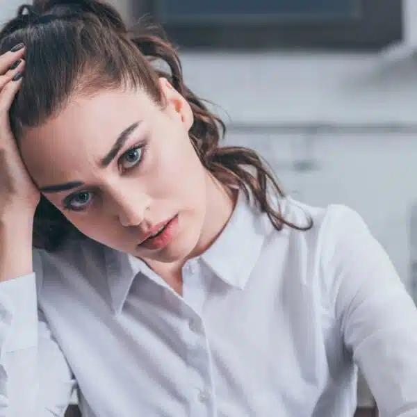 Woman living paycheck to paycheck