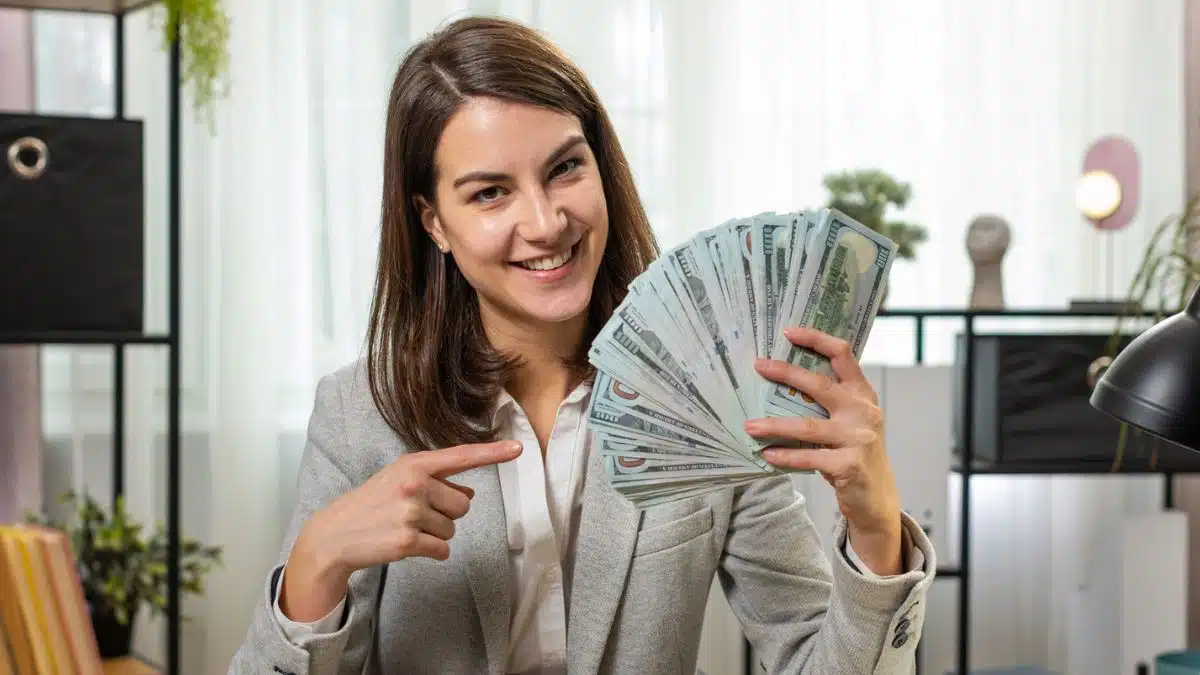 Woman receiving her pay in cash
