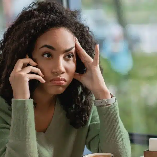 Woman worried about her next paycheck