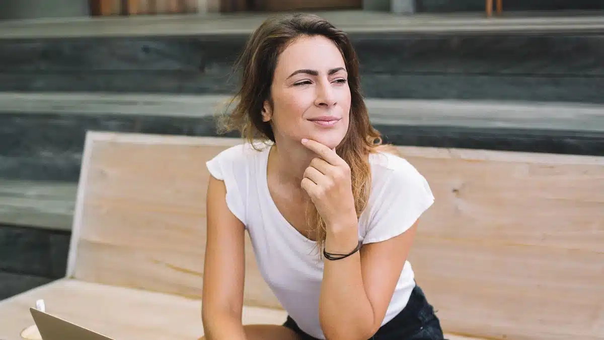 Woman writing down her goals