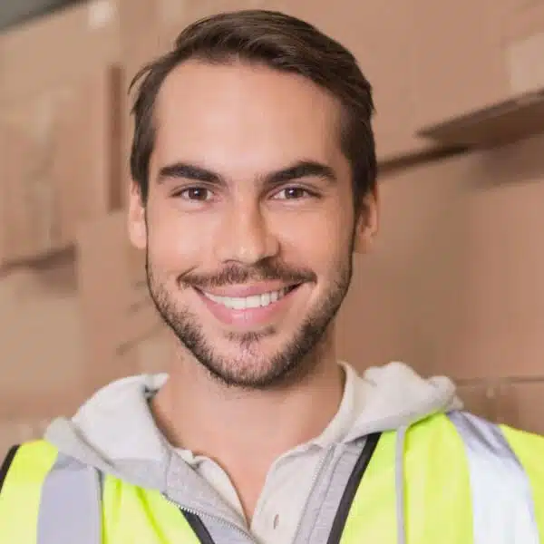 Young man working in a warehouse