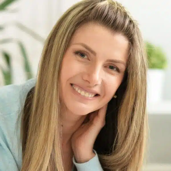 woman smiling with laptop