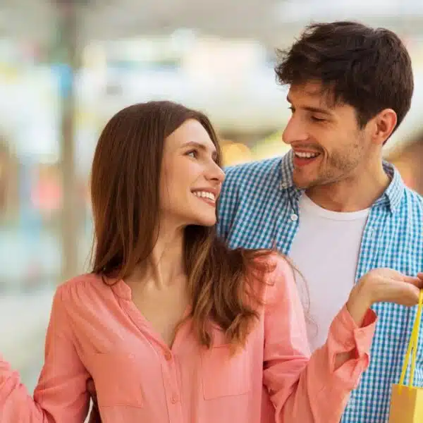 Couple making purchases at the mall