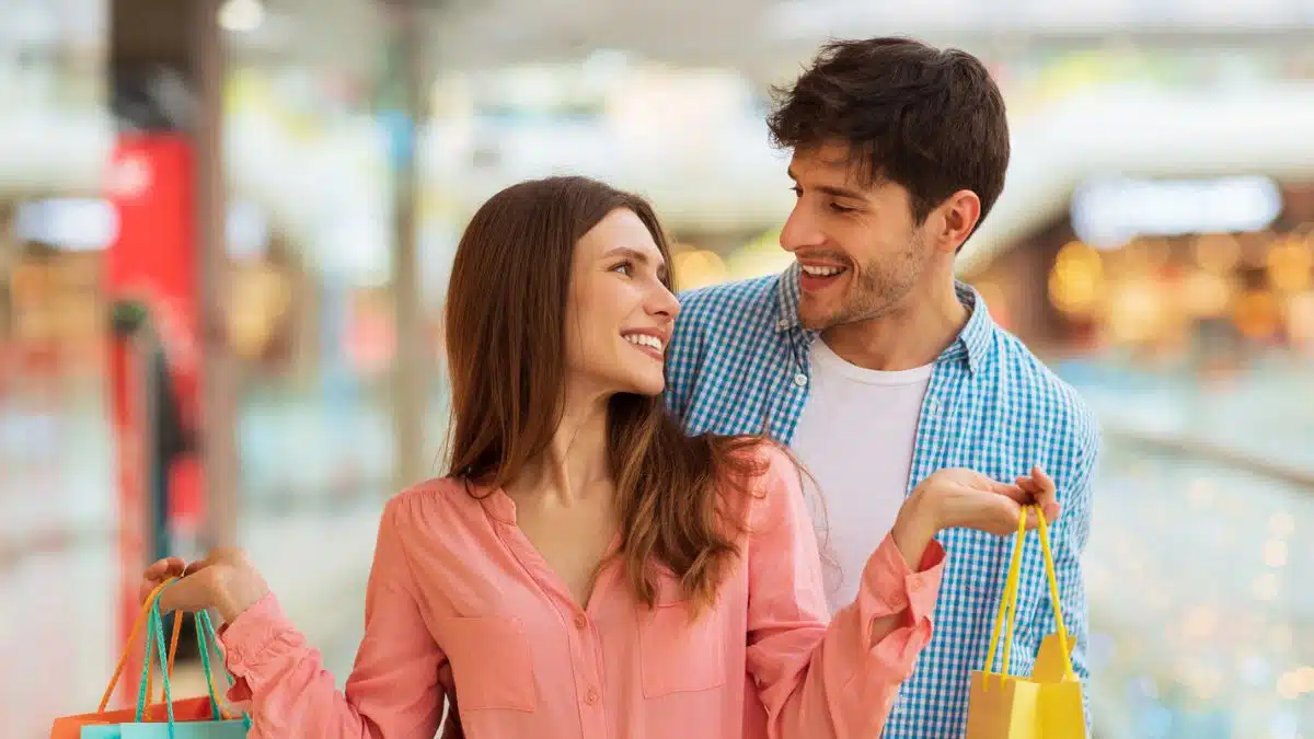 Couple making purchases at the mall