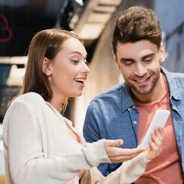 Couple reviewing grocery prices