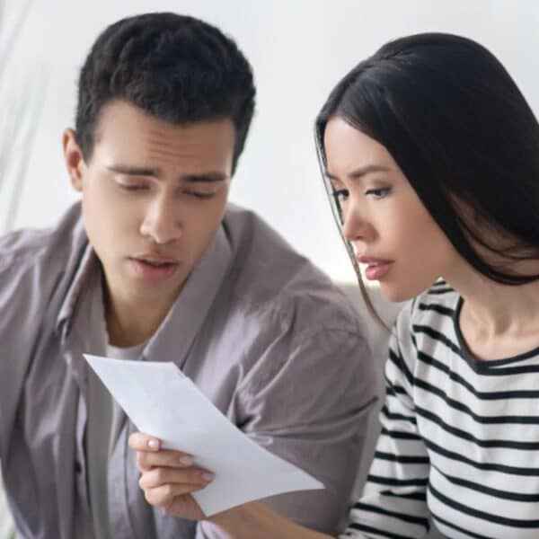 Couple stressed over their bank statements