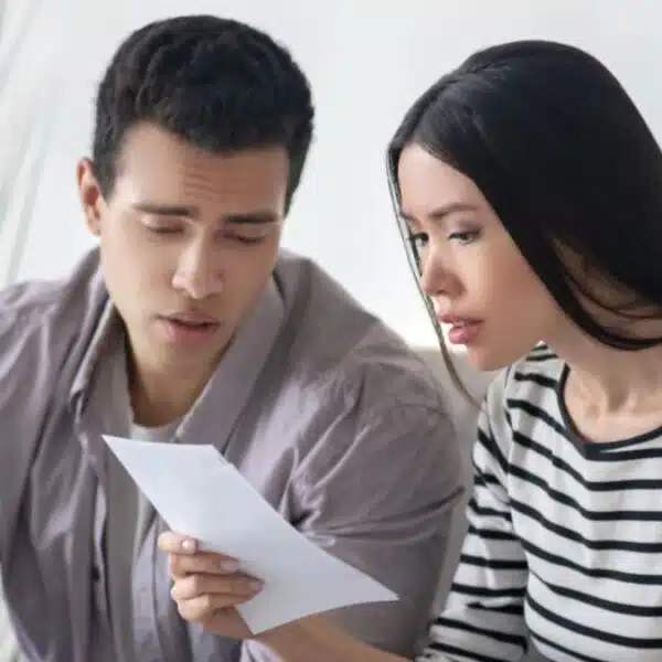 Couple stressed over their bank statements