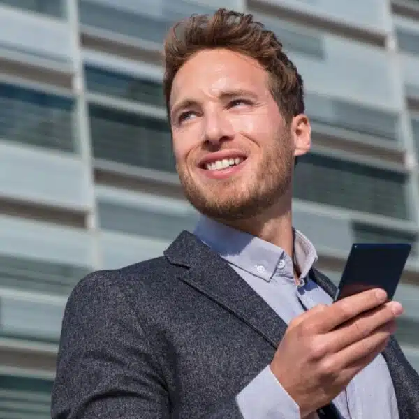 Man checking emails on his phone