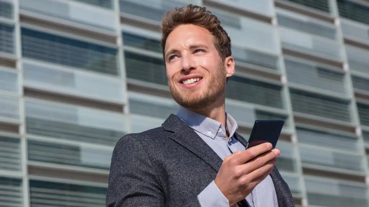 Man checking emails on his phone
