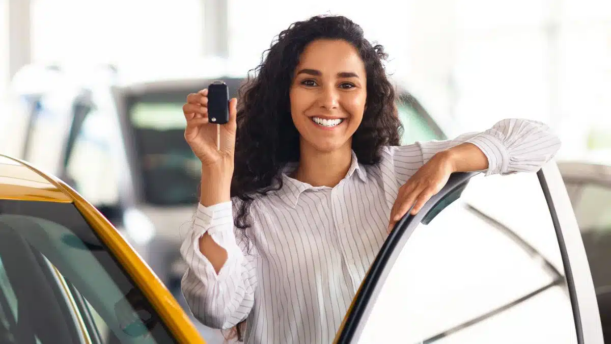 Woman driving a new car