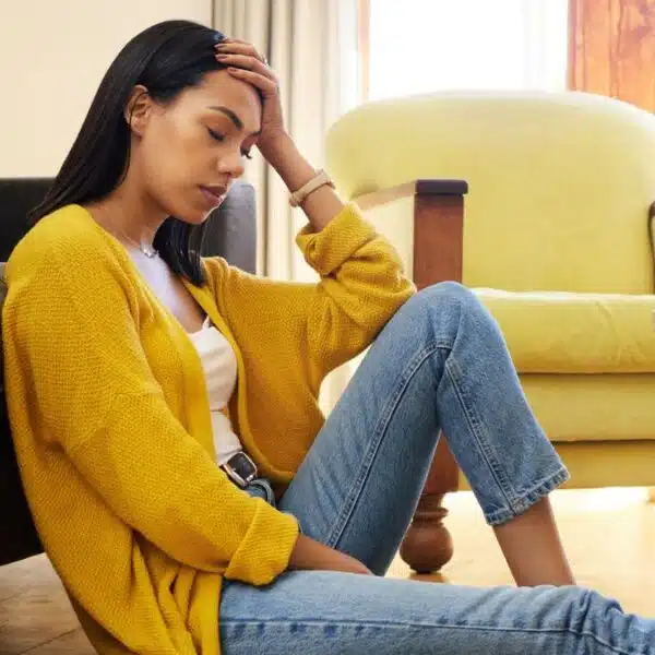Woman feeling broke and living paycheck to paycheck