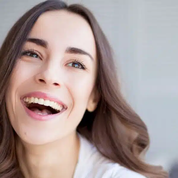 Woman laughing with her friends