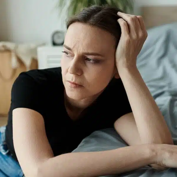 Woman looking back on her financial decisions