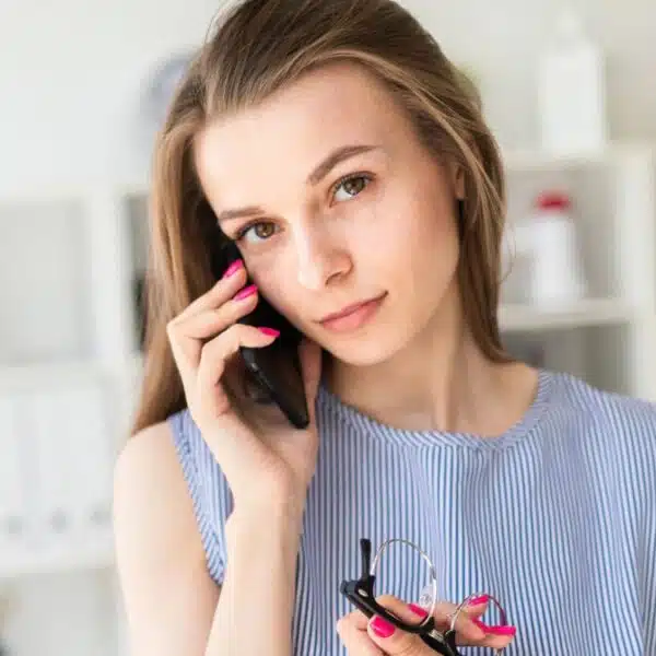 Woman making a phone call to the bank