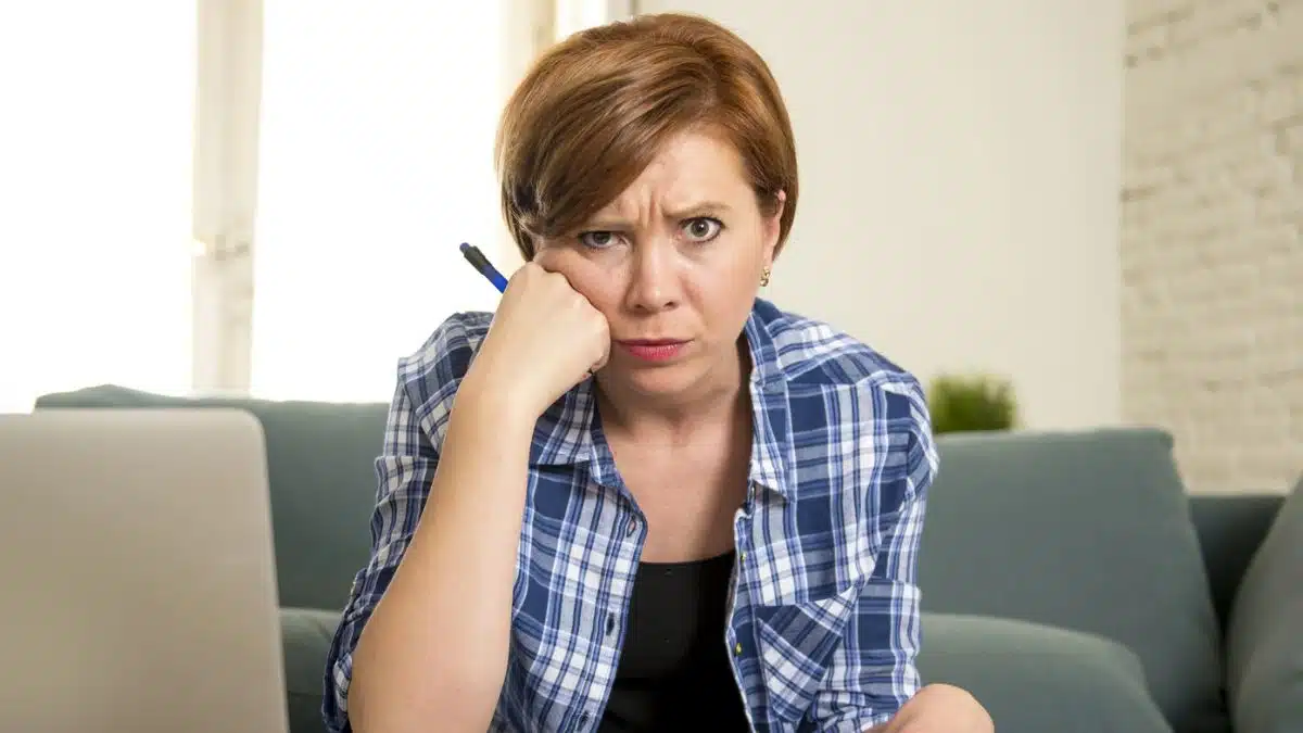 Woman overwhelmed by her finances