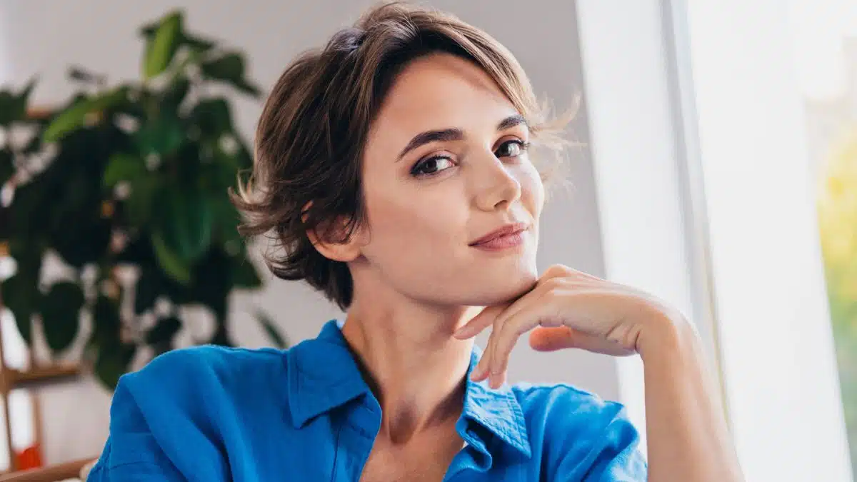 Woman reflecting on her financial choices