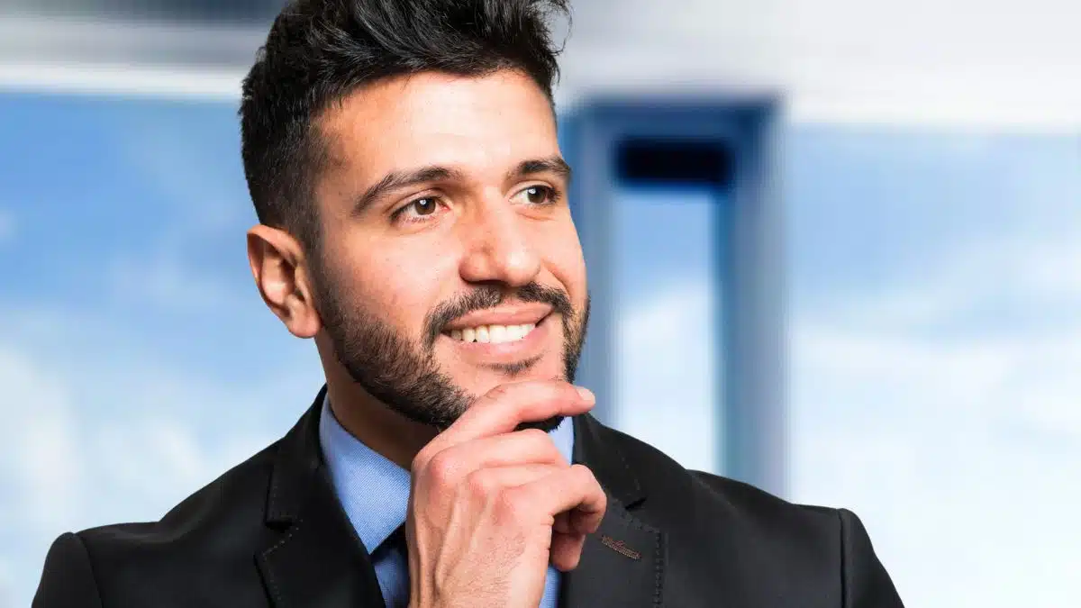 business man in a red suit and tie