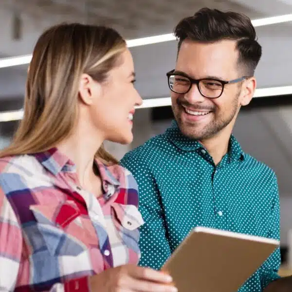 co workers talking about business