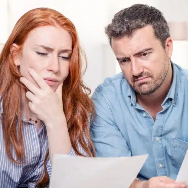 couple reviewing their bank statements