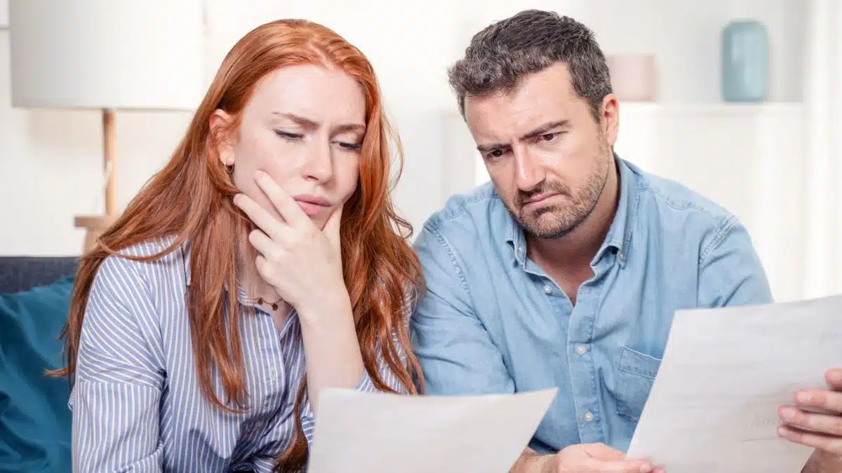 couple reviewing their bank statements