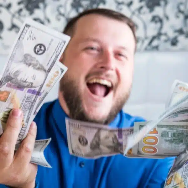 man holding cash a lot