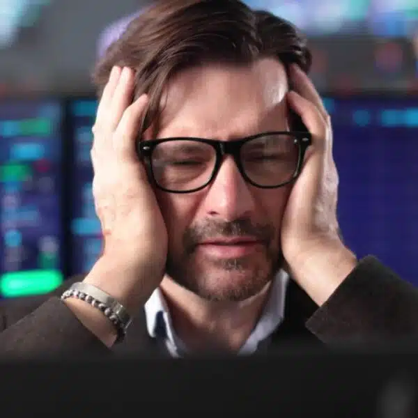 man stressed about the stock market