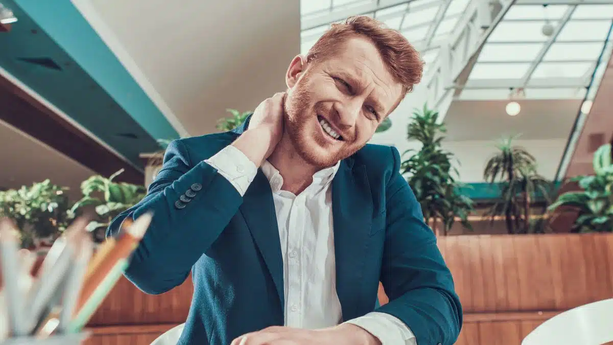 man working in the office tired