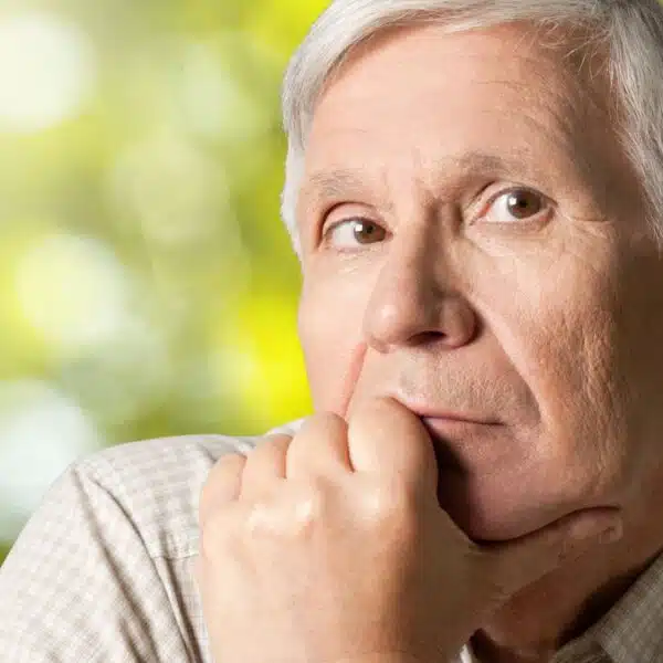 senior man sitting and thinking