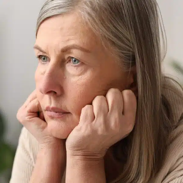 senior woman sad upset at home